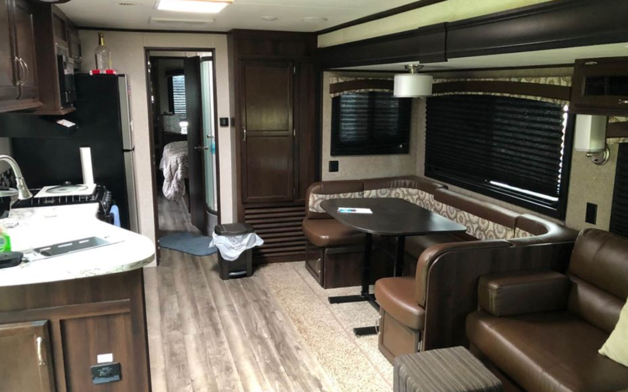 Interior view of camper showing eating area.