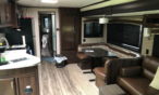 Interior view of camper showing eating area.