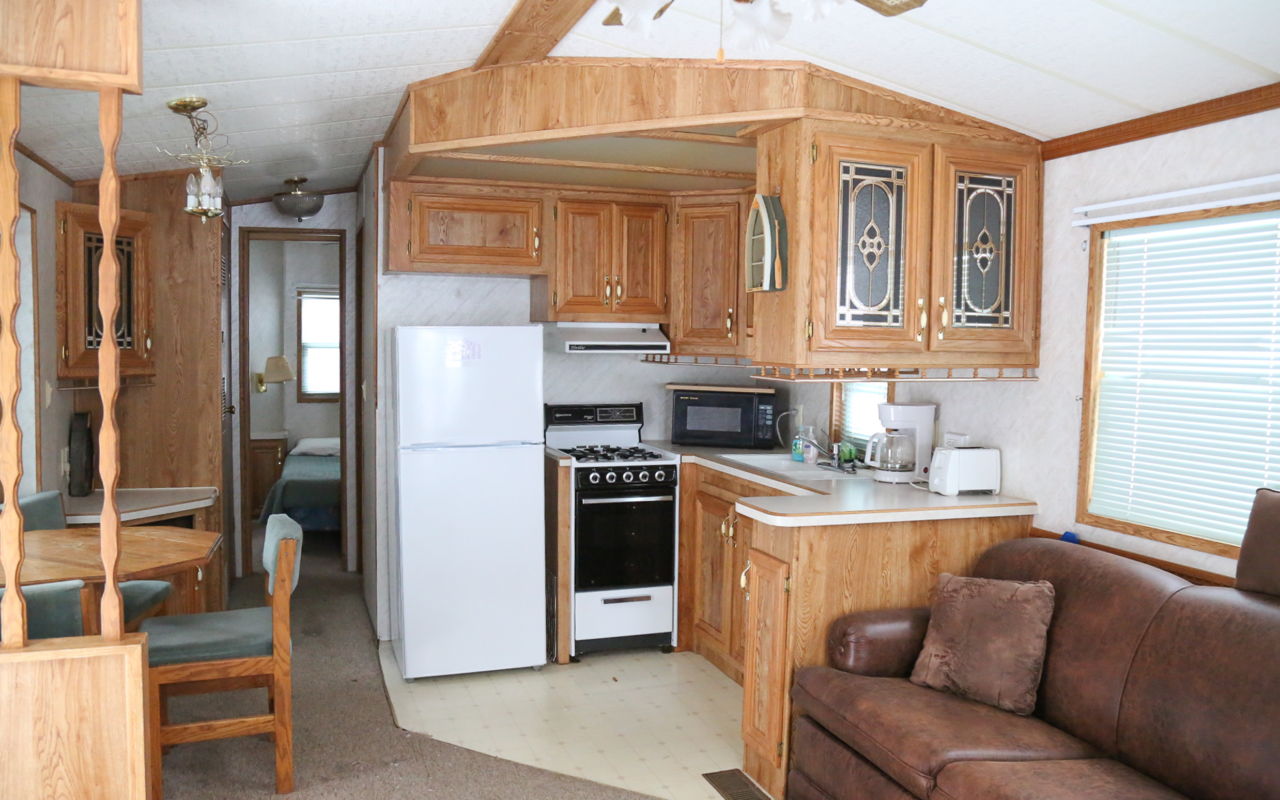 Cabin interior view of kitchen.