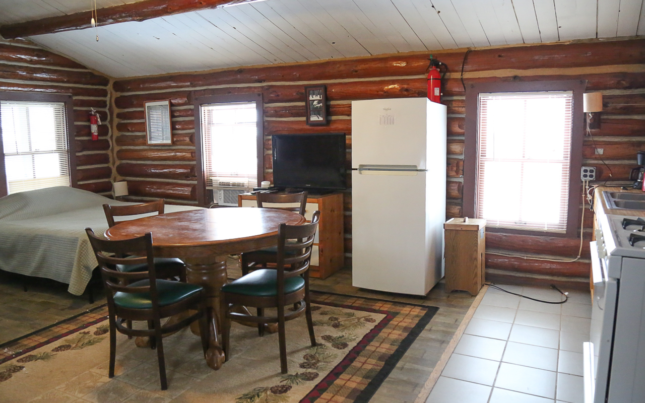 View of dining area and part of the kitchen in the cabin