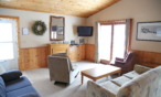 Interior cabin view of living room area.