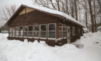Exterior cabin view in winter.