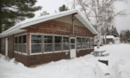 Cabin exterior view in the winter.
