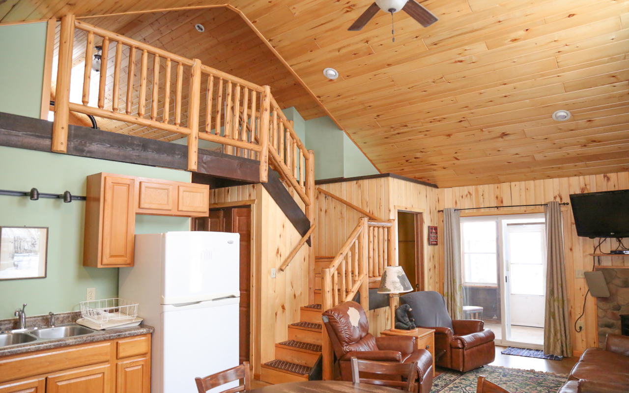 Interior view of loft, kitchen and sitting area.