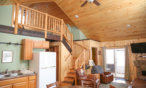 Interior view of loft, kitchen and sitting area.