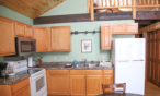 Interior cabin view of kitchen.